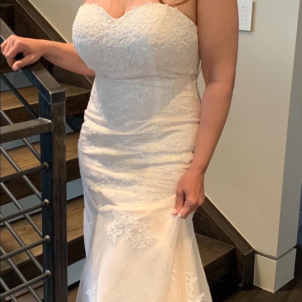 New.  Wedding gown, size 6.